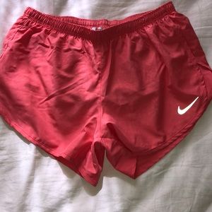 Coral Nike shorts